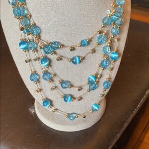 Vibrant Blue Multi-Strand Necklace with Translucent Beads